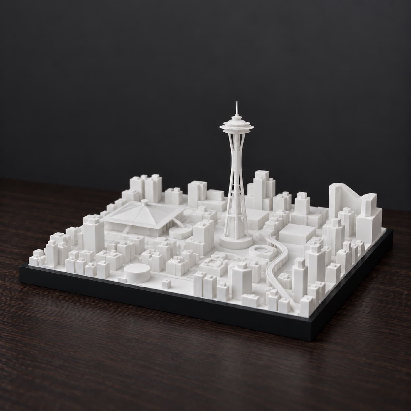 The Seattle Skyline Lamp, unlit, on a desk